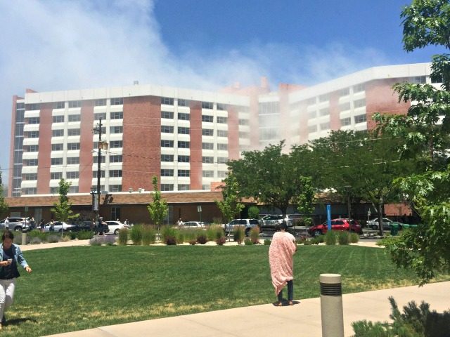 Plumes of smoke from an explosion inside a residence hall at the University of Nevada, Ren