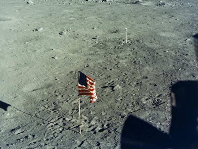 The United States flag is planted on the surface of the Moon by the astronauts of NASA's Apollo 11 lunar landing mission, as seen from inside the Lunar Module the 'Eagle', 20th July 1969. In the background is the black and white lunar surface television camera which televised astronauts Neil …