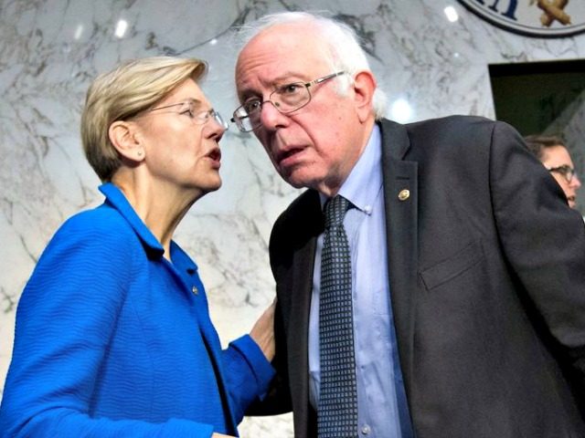 Sens. Elizabeth Warren and Bernie Sanders. Jose Luis Magana/AP Images
