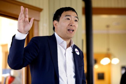 Under newly crafted rules, Andrew Yang (above) and Marianne Williamson are poised to qualify for the first Democratic debate later this year. | Joshua Lott/AFP/Getty Images