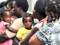 African migrants wait to get humanitarian visas granted by the Mexican National Migration Institute (INM) in Tapachula, Chiapas, southern Mexico, on June 12, 2019. (Credit: QUETZALLI BLANCO/AFP/Getty Images)