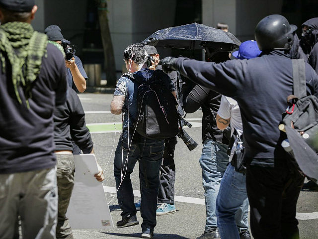 PORTLAND, OR - JUNE 29: Andy Ngo, a Portland-based journalist, is seen covered in an unknown substance after unidentified Rose City Antifa members attacked him on June 29, 2019 in Portland, Oregon. Several groups from the left and right clashed after competing demonstrations at Pioneer Square, Chapman Square, and Waterfront …