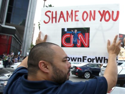 Bernie's supporters protest against the lack of Sanders coverage in front of the CNN building in Los Angeles, California, on April 3, 2016. / AFP / TOMMASO BODDI (Photo credit should read TOMMASO BODDI/AFP/Getty Images)