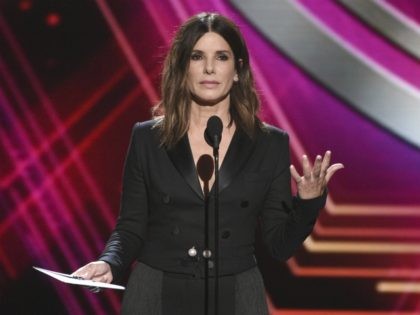 Sandra Bullock presents the award for best team at the ESPY Awards on Wednesday, July 10, 2019, at the Microsoft Theater in Los Angeles. (Photo by Chris Pizzello/Invision/AP)