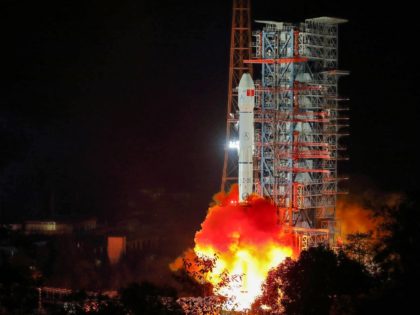 A Long March 3B rocket lifts off from the Xichang launch centre in Xichang in China's southwestern Sichuan province early on December 8, 2018. - China launched a rover early on December 8 destined to land on the far side of the moon, a global first that would boost Beijing's …