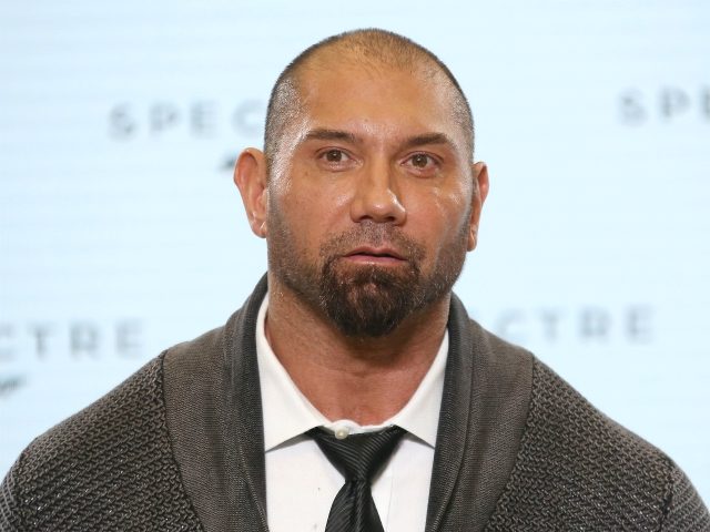 Actor Dave Bautista poses for photographers at the announcement for the new Bond film, the 24th in the series, at Pinewood Studios in west London, Thursday, Dec. 4, 2014. The title of the new Bond production is Spectre. (Photo by Joel Ryan/Invision/AP)