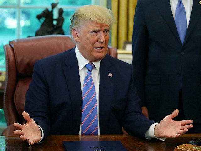WASHINGTON, DC - JULY 01: US President Donald Trump speaks to the media after signing a bill for border funding in the Oval Office at the White House on July 1, 2019 in Washington, DC. (Photo by Mark Wilson/Getty Images)