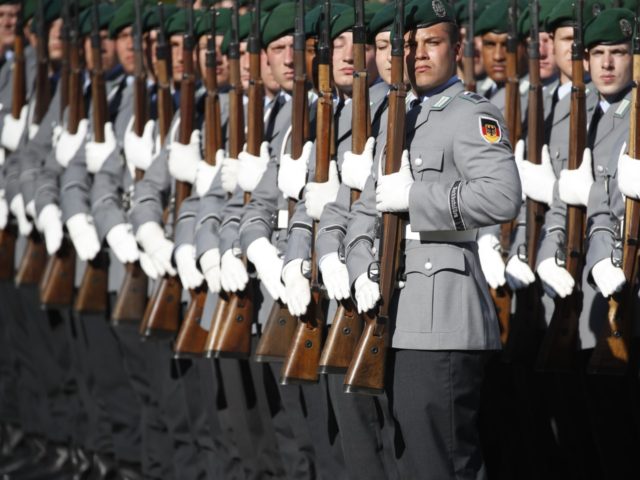 Soldiers of a German honor guard are pictured during a military ceremony for newly accredi