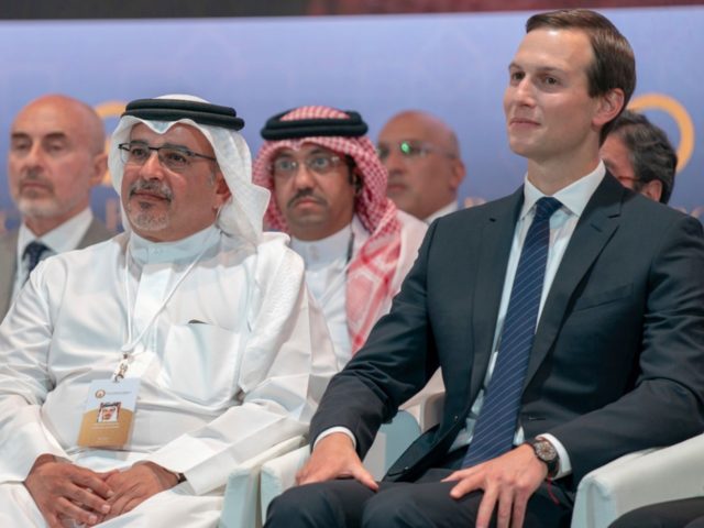 In this Tuesday, June 25, 2019, photo released by Bahrain News Agency, from left to right, U.S. Treasury Secretary Steven Mnuchin, Bahrain Crown Prince Salman bin Hamad Al Khalifa and White House senior adviser Jared Kushner attend the opening session of the "Peace to Prosperity" workshop in Manama, Bahrain. Amid …