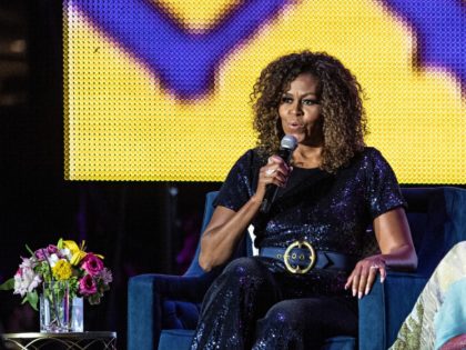 Michelle Obama and Gayle King seen at the 2019 Essence Festival at the Mercedes-Benz Super