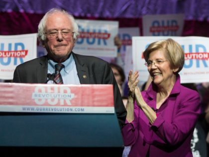 BOSTON, MA - MARCH 31: Vermont Senator and former Presidential candidate Bernie Sanders (I Ð VT) and Senator Elizabeth Warren (D-MA) speak at the Our Revolution Massachusetts Rally at the Orpheum Theatre on March 31, 2017 in Boston, Massachusetts. (Photo by Scott Eisen/Getty Images)