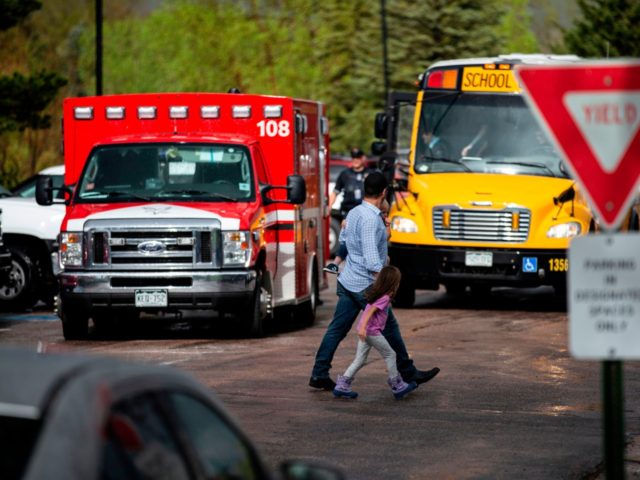 Students are evacuated from the Recreation Center at Northridge in Highlands Ranch after a shooting at the STEM School Highlands Ranch on May 7, 2019. - At least seven students were wounded on May 7 in a school shooting in the US state of Colorado, police said, across town from …