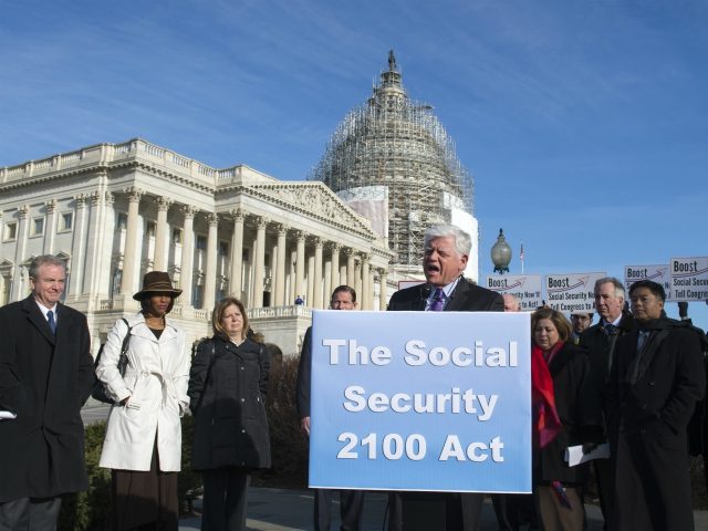 Rep. John B. Larson, D-Conn., accompanied by members of the House Ways & Means Committee, Social Security advocates, speaks during a news conference on Capitol Hill in Washington, Wednesday, March 18, 2015, to announce the introduction of the Social Security 2100 Act. (AP Photo/Molly Riley)