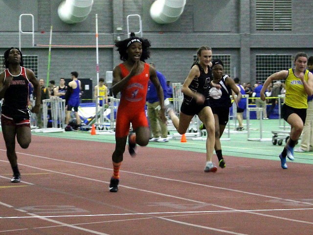 FILE - In this Feb. 7, 2019 file photo, Bloomfield High School transgender athlete Terry Miller, second from left, wins the final of the 55-meter dash over transgender athlete Andraya Yearwood, far left, and other runners in the Connecticut girls Class S indoor track meet at Hillhouse High School in …