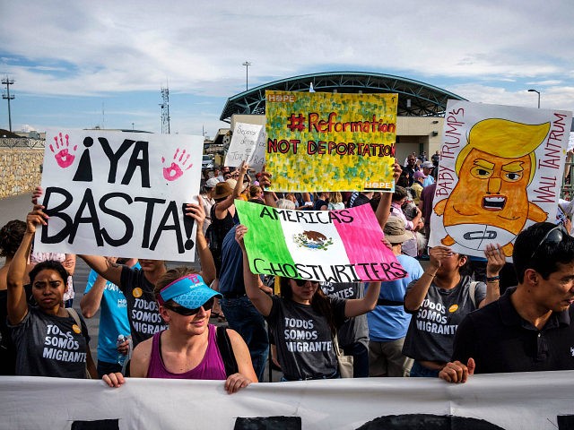 People gather outside a border crossing to protest the treatment of immigrants in detention centers during the "Lights for Liberty: A Vigil to End Human Concentration Camps" event in El Paso, Texas, on July 12, 2019. - The march is occurring in at least 11 major US cities among 700 …