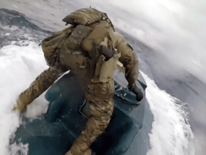 US Coast guardsmen jump onto homemade submarine filled with cocaine