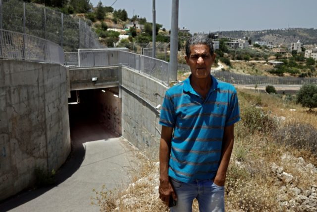 For Palestinian family, tunnel under Israel barrier leads home