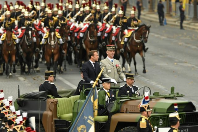 Paris clashes tarnish Macron's military parade