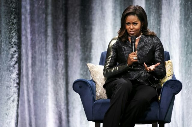 'It's our America,' reminds Michelle Obama