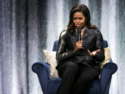 'It's our America,' reminds Michelle Obama