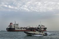Asian markets sink as traders consider Fed rate cut
