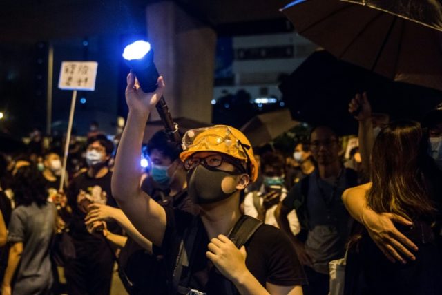 Clashes In Hong Kong After Police Charge Protesters With Rioting ...