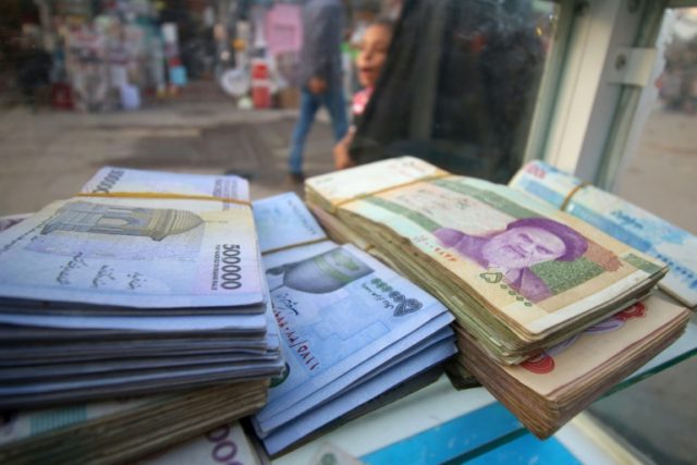 Sanctions-hit Iran to cut zeros and rename plunging currency