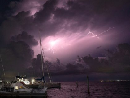 CANCUN - SEPTEMBER 29: A general view of a lightning storm over the Isla Mujeres as seen f