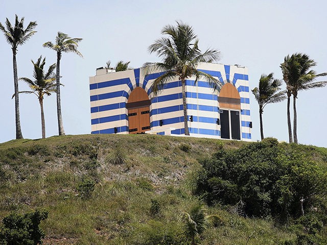 A blue-striped structure sits on a lookout point on Little St. James Island, in the U. S. Virgin Islands, a property owned by Jeffrey Epstein, Wednesday, Aug. 14, 2019. Epstein bought Little St. James Island more than two decades ago and built a stone mansion with cream-colored walls on one …
