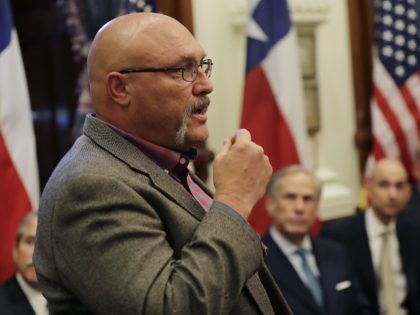 FILE - In a May 24, 2018 file photo, Frank Pomeroy, pastor of First Baptist Church of Sutherland Springs, standing, speaks during a roundtable discussion to address safety and security at Texas schools in the wake of the shooting at Santa Fe, in Austin, Texas. Pomeroy whose teenage daughter was …