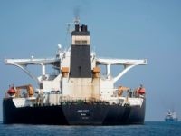 A view of the Grace 1 super tanker with the name "Adrian Darya 1" over the place where "Grace 1" had already been blackened out is seen in the British territory of Gibraltar, Saturday, Aug. 17, 2019. The shipping agent for an Iranian supertanker caught in a diplomatic standoff says …