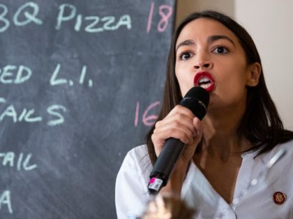 U.S. Rep. Alexandria Ocasio-Cortez (D-NY) speaks to supporters and restaurant workers at the Queensboro Restaurant, May 31, 2019 in the Queens borough of New York City. Ocasio-Cortez participated in an event to raise awareness for the One Fair Wage campaign, which calls to raise the minimum wage for tipped workers …