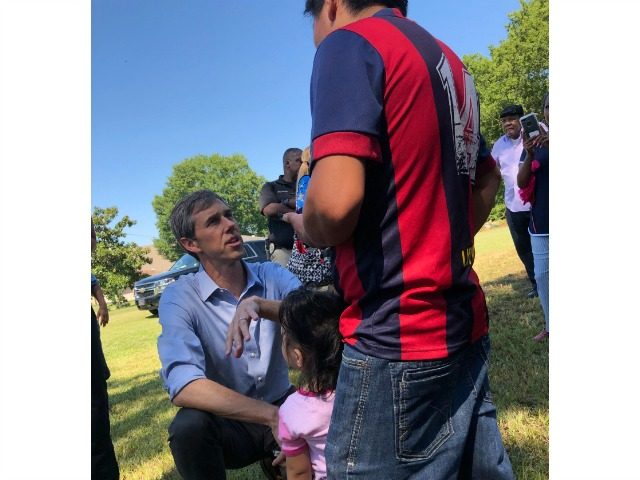 Presidential candidate Beto O'Rourke speaks in Spanish to Guatemalan immigrant Agusto Lopez Coronado in Canton, Miss., on Friday, Aug. 16, 2019. Coronado initially declined to give his name to journalists because of fears of repercussions days after the immigration raids at chicken processing plants in Mississippi. Coronado later identified himself …