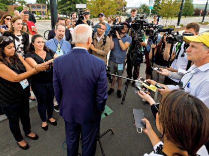 Democratic presidential candidate former Vice President Joe Biden speaks to reporters after a campaign stop at Lindy's Diner in Keene N.H., Saturday, Aug. 24, 2019. (AP Photo/Michael Dwyer)