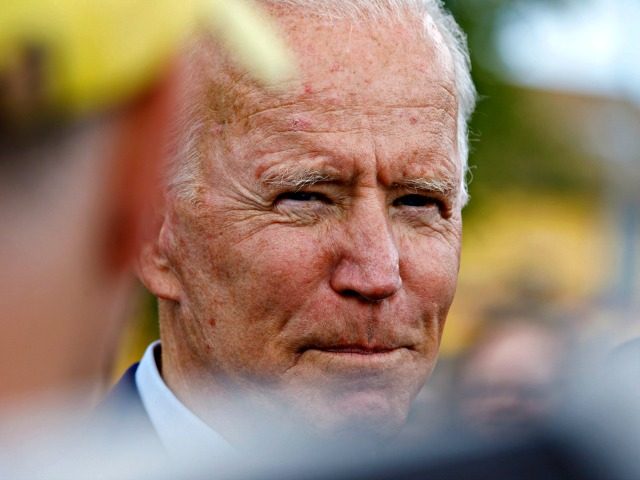 Democratic presidential candidate former Vice President Joe Biden speaks with reporters after a campaign stop at Lindy's Diner in Keene N.H., Saturday, Aug. 24, 2019. (AP Photo/Michael Dwyer)