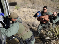 U.S. Border Patrol agents rescue a Guatemalan woman found unresponsive in the Arizona desert Mountains. (Photo: U.S. Border Patrol/Tucson Sector)