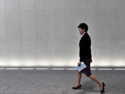 Hong Kong Chief Executive Carrie Lam arrives at a press conference in Hong Kong on August 5, 2019. - Peak-hour morning train travel and international flights in Hong Kong were thrown into chaos as pro-democracy protesters launched an attempted city-wide strike to ramp up pressure on the financial hub's embattled …
