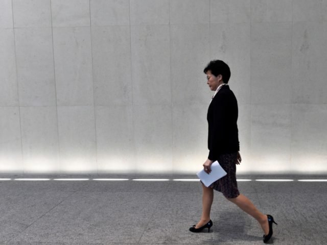 Hong Kong Chief Executive Carrie Lam arrives at a press conference in Hong Kong on August