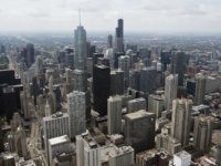 The downtown Chicago skyline, including the Willis Tower, formerly known as the Sears Tower, are seen in this aerial photograph over Chicago, Illinois, May 30, 2013. AFP PHOTO / Saul LOEB (Photo credit should read SAUL LOEB/AFP/Getty Images)