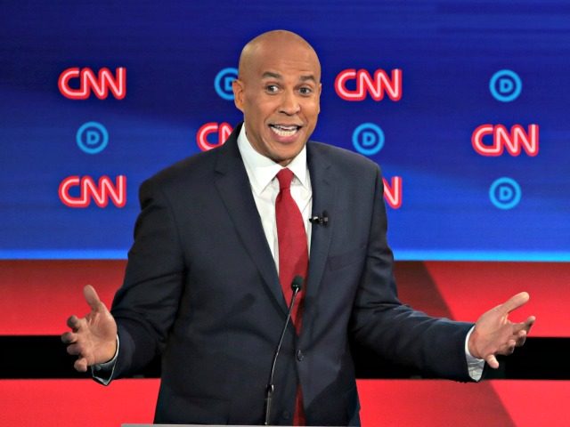 DETROIT, MICHIGAN - JULY 31: Democratic presidential candidate Sen. Cory Booker (D-NJ) speaks during the Democratic Presidential Debate at the Fox Theatre July 31, 2019 in Detroit, Michigan. 20 Democratic presidential candidates were split into two groups of 10 to take part in the debate sponsored by CNN held over …