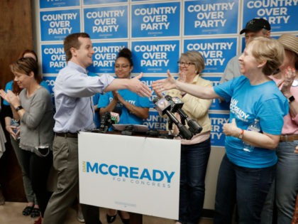 Ninth Congressional district Democratic candidate Dan McCready greets supporters as he arrives for a news conference in Charlotte, N.C., Wednesday, May 15, 2019. McCready faces Republican Dan Bishop, as well as Libertarian and Green candidates, on Sept. 10. (AP Photo/Chuck Burton)
