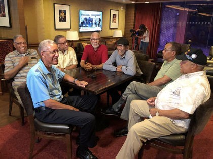 Seven Davis brothers - Eddie, Frederick, Arguster, Octavious, Nathaniel, Julius and Lebronze chat during a reunion at a hotel-casino on Friday, July 12, 2019 in Tunica, Miss. In 2017, the Davis men were honored by the National Infantry Museum Foundation. The foundation’s president calls their combined military record “nothing short …