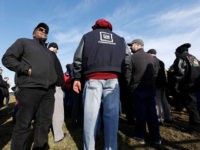 WARREN, MI - FEBRUARY 22: United Auto Workers members hold a prayer vigil at the General Motors Warren Transmission Operations Plant on February 22, 2019 in Warren, Michigan. Almost 300 people are being laid off at the plant as a result of GM's decision to idle the Warren facility. (Photo …