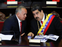 President of Venezuela Nicolás Maduro (R) talks to President of the Constituent Assembly Diosdado Cabello (L) before talkig to judges and members of the Supreme Justice Tribunal on its annual opening day of sessions on January 24 in Caracas, Venezuela. Yesterday opposition leader and head of the National Assembly Juan …