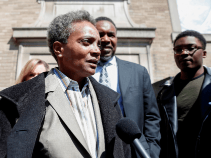 Chicago Mayor-elect Lori Lightfoot leaves the Rainbow PUSH Coalition after a unity press conference with mayoral candidate Toni Preckwinkle in Chicago, Illinois on April 3, 2019. (Photo by Kamil Krzaczynski / AFP) (Photo credit should read KAMIL KRZACZYNSKI/AFP/Getty Images)