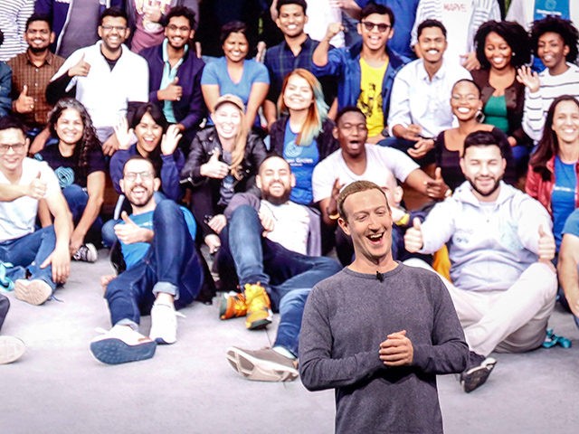 Facebook CEO Mark Zuckerberg is applauded as he delivers the opening keynote introducing n