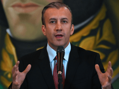 Venezuelan Vice-President Tareck El Aissami delivers a press conference in Caracas on May 10, 2019. - Venezuela announced Friday the reopening of its land border with Brazil and its maritime border with Aruba, which had been closed since February. (Photo by Marvin RECINOS / AFP) (Photo credit should read MARVIN …