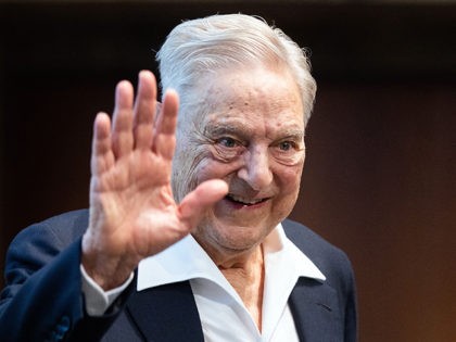 Hungarian-born US investor and philanthropist George Soros talks to the audience after rec