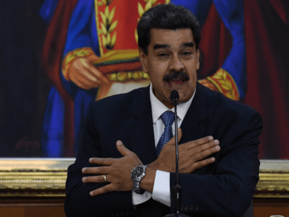 Venezuelan President Nicolas Maduro gestures as he speaks during the Simon Bolivar nationa
