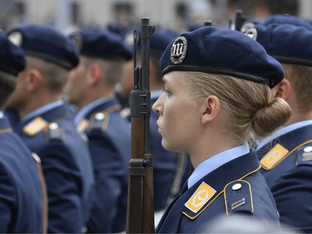 A new Air Force recruit stands to attention during a swearing-in ceremony of German Bundeswehr soldiers at the German Defence Ministry in Berlin, on July 20, 2019. (Photo by John MACDOUGALL / AFP) (Photo credit should read JOHN MACDOUGALL/AFP/Getty Images)